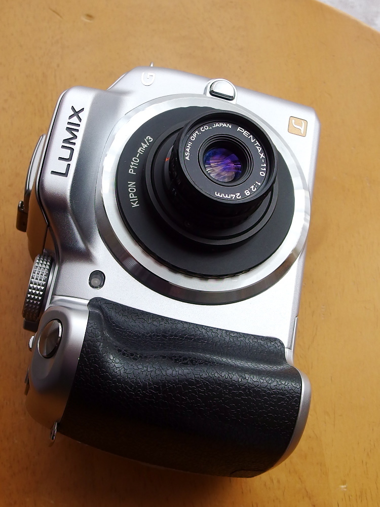PENTAX auto110用の標準レンズ PENTAX-110 24mm/F2.8を、マイクロ ...